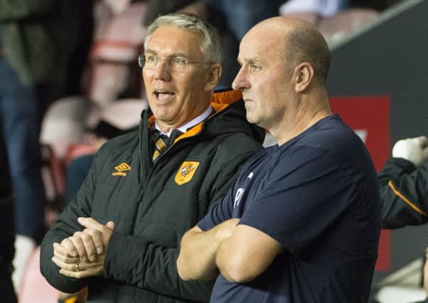 Former Latics team-mates Paul Cook and Nigel Adkins share a chat on Tuesday night