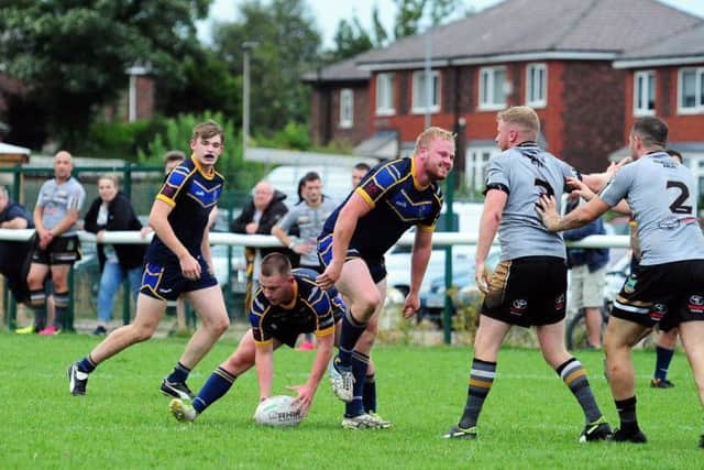 Orrell St James (pictured in action against Hindley) clinched top spot after a horrendous experience at Widnes West Bank.  Picture: Brian King