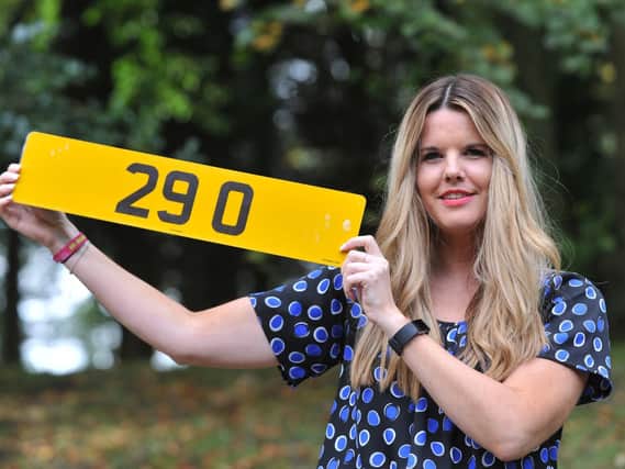Lynsay Martin from the DVLA with a registration plate which went up for auction