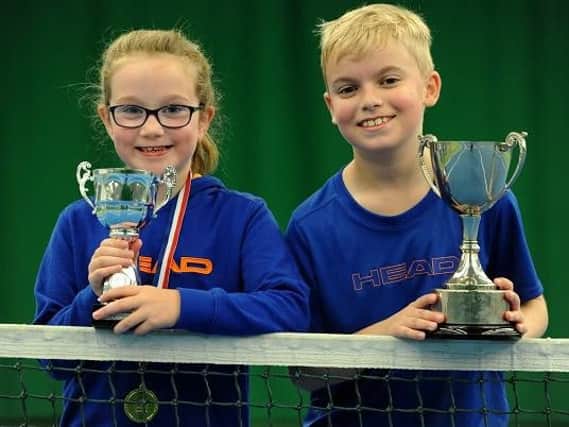 Isabella and Dylan with their trophies