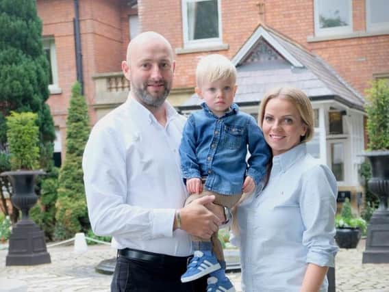 Sarah, her husband Jamie and Hugo at Kilhey Court where they are holding their ambitious fund-raiser in memory of Hugos twin Theo who sadly died before he was born