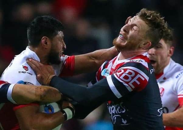 Jackson Hastings (right) in  action for Sydney Roosters against St Helens in 2016's World Club Challenge