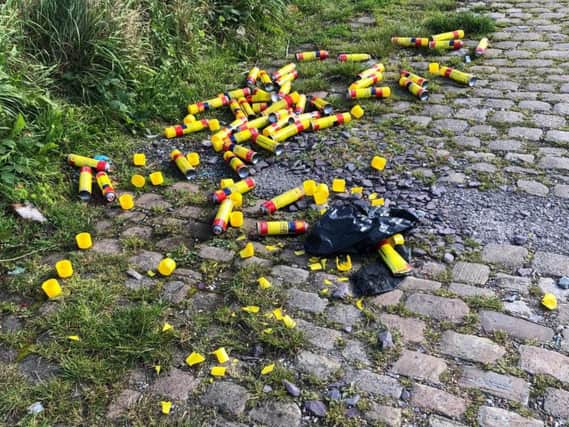 Empty gas canisters have been found at the vacant plot of land