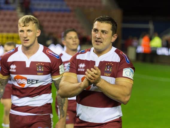 Ben Flower (right) celebrates Wigan's win over Castleford on Friday night