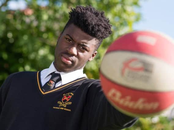St John Fisher student Victor Ndoukou has a bright future ahead of him on the basketball court