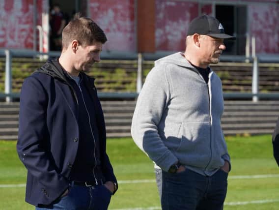 Steven Gerrard and Peter Schmeichel at Wigan's training base in Orrell
