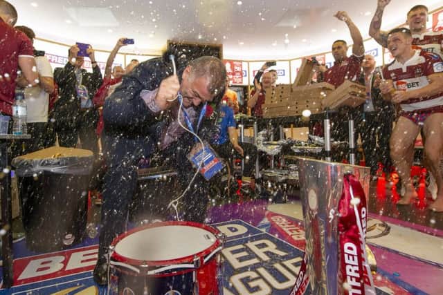 Shaun Wane leads the beat to the Wigan victory song one final time. Picture: Allan McKenzie/SWPix.com