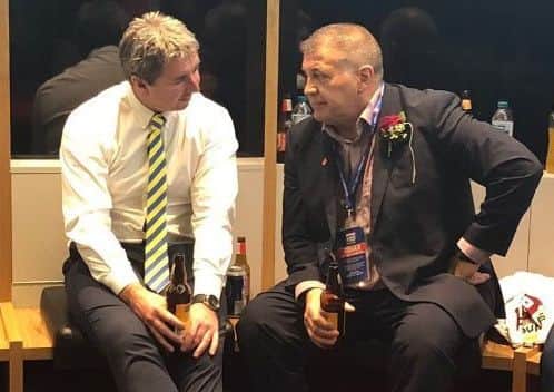 Steve Price had a beer with Shaun Wane in the Wigan dressing room. Picture: Wigan Warriors