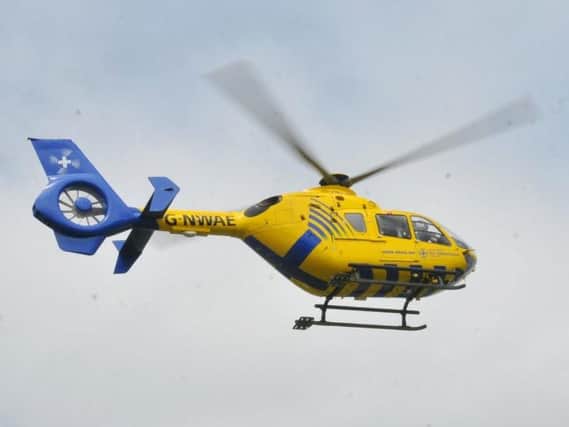 An air ambulance landed at the scene