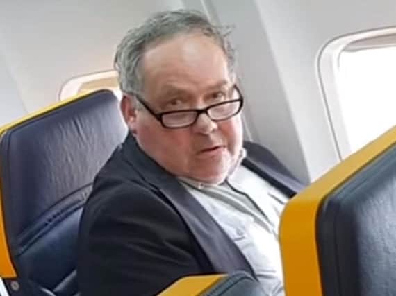 A passenger on Ryanair flight FR015 from Barcelona to London Stansted who launched a racist tirade against the woman in the seat next to him.