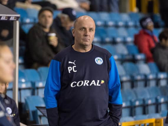 Paul Cook watches from the sidelines at The Den