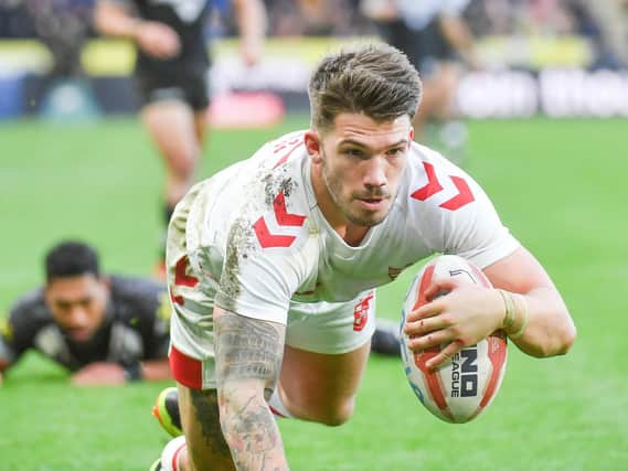 Oliver Gildart goes over for England on his Test debut. Picture by SWpix