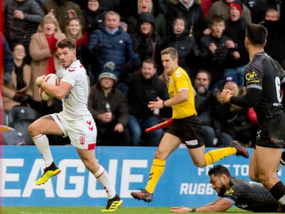 Oliver Gildart scored on his debut to give England an 18-16 win over NZ