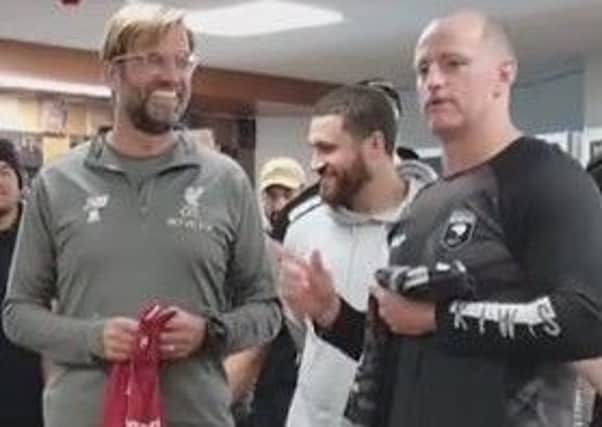 Michael Maguire and Jurgen Klopp met at Liverpool's training base, as seen from this video on the NRL site