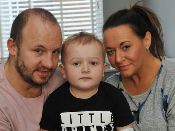 Loz and Katt Hamilton with son Theo
