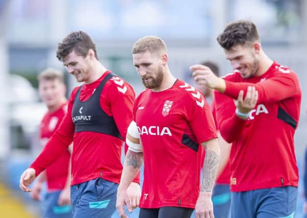 John Bateman, Sam Tomkins and Oliver Gildart in training in Manchester yesterday. Picture: SWPix
