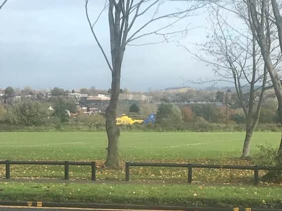 The air ambulance landed on a car park outside the DW Stadium