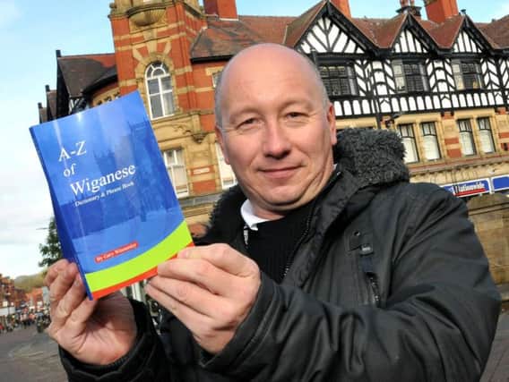 Gary in Wigan town centre with his new book