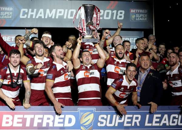 Wigan will begin the defence of their Super League title against St Helens