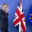 Former Secretary of State for Exiting the European Union Dominic Raab, left, and EU chief Brexit negotiator Michel Barnier