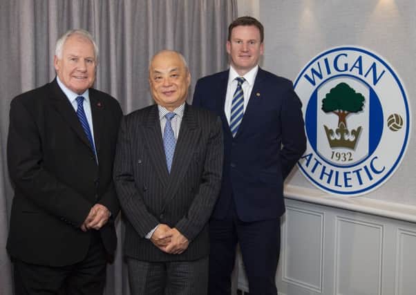 Joe Royle (left) is part of the new board at Wigan Athletic
