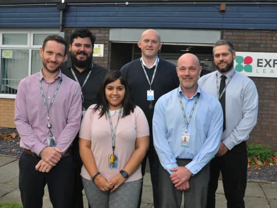 Left, headteacher Richard King, with staff at Expanse Learning Wigan