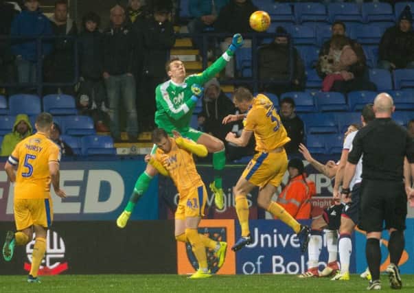 Christian Walton does well to help the ball away