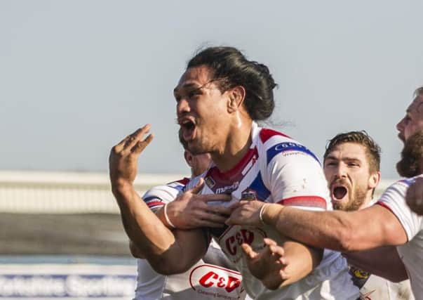Taulima Tautai and Jarrod Sammut (right) at Wakefield together