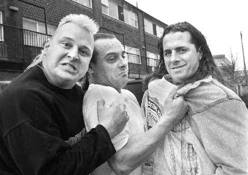 Bret Hart (far right) with Tom Billington on a trip to Wigan
