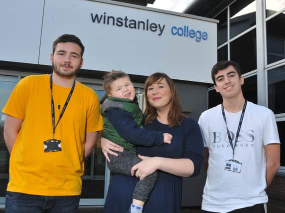 Claire Carter with son Owen and Joshua Barr, left, and Ryan Roberts from Winstanley College