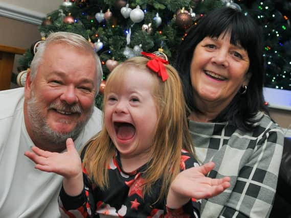 Five-year-old Bethany Parr with proud parents Ian and Beverley
