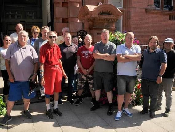 Traders from Wigan Market and opposition councillors holding a protest against the VAT payments outside Wigan Town Hall earlier this year