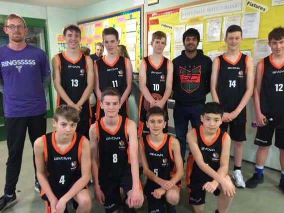 Josh Metters with players of Mammoth Basketball, in Chorley