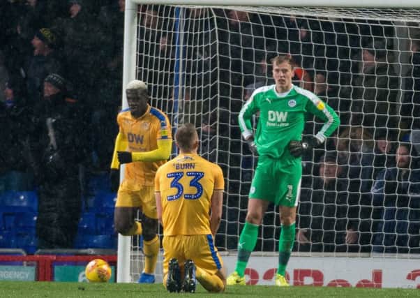 Disappointment in the Latics defence after the winning goal at Ipswich