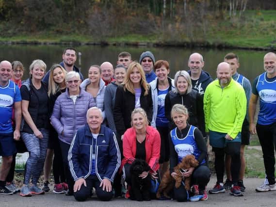 Julie Aubrey-Williams and family are organising a charity run for MIND following the suicide of her brother Mark.
Julie (front right), her father Alan Baggaley (front left) and others taking part in the run.