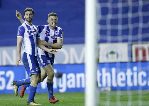 Will Grigg and Max Power celebrate THAT goal against Manchester City last term