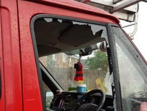 Damage to a van in Scholes