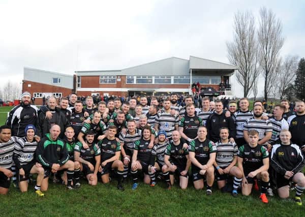 Wigan RUFC and Wigan St Patrick's took part in the inaugural Ronnie Dutch Memorial Match in memory of a legend of both clubs. The two teams before kick-off.  Pictures: Rob Lock