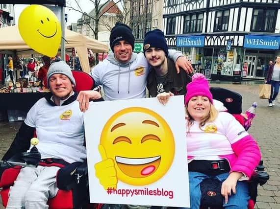 Happy Smiles crowdfunder launch in Wigan town centre, with left to right,  Haydn, Alex, Kurt and Ellie, and below,  Warriors ace Liam Farrell