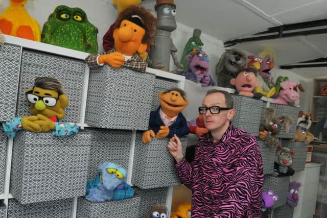 Phil with his army of puppets