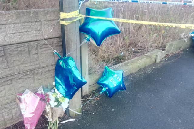 Balloons and flowers were left on Bickershaw Lane for Billy