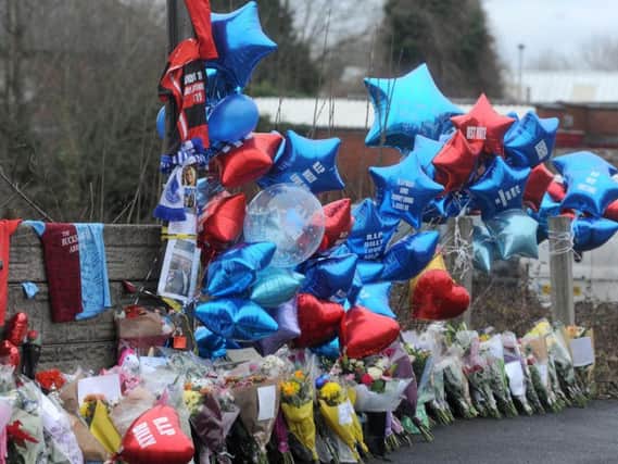 Flowers and balloons are among the tributes left for Billy Livesley