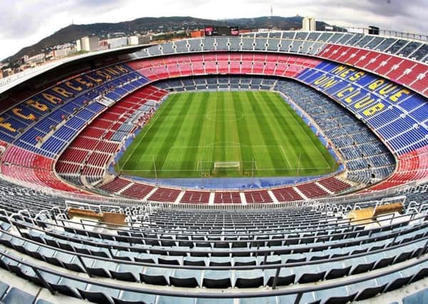 Wigan will play at Barcelona in May