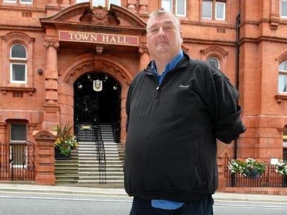 Coun Bob Brierley outside the town hall