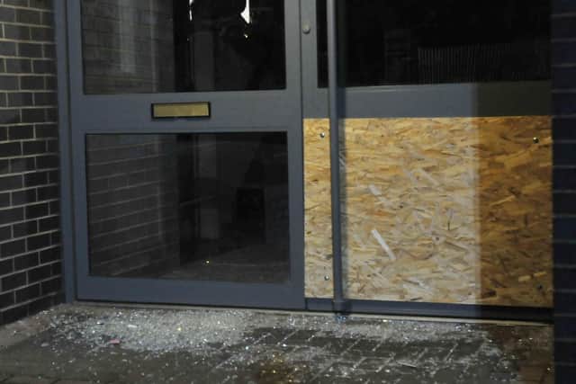 The wrecked windows following  the break-in at the play centre