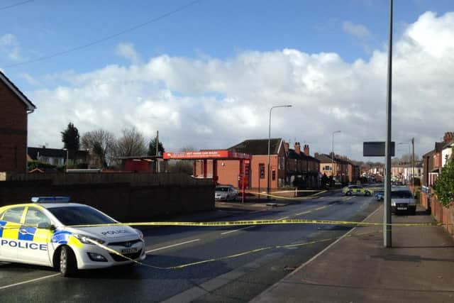 The scene at the car wash off Bolton Road, in Ashton, following the shooting