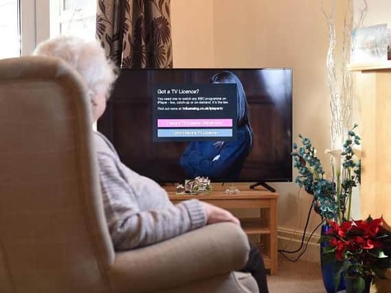 Losing free TV licences will be a blow for thousands of Wigan pensioners