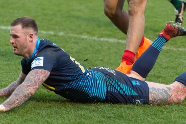 Zak Hardaker goes over for his first Wigan try against Salford on Sunday