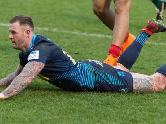 Zak Hardaker goes over for his first Wigan try against Salford on Sunday