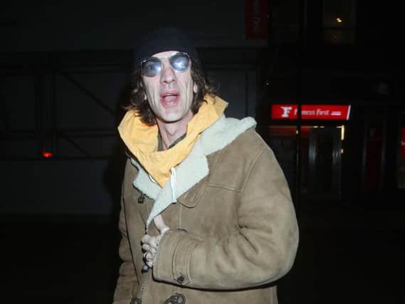 Richard Ashcroft arrives for his early morning performance for Chris Evans's new Virgin Radio show